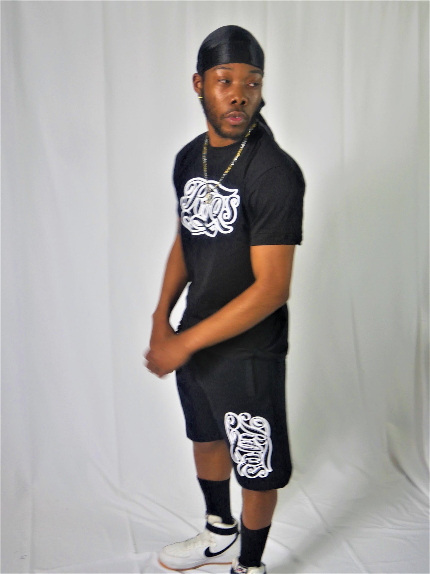 Raqs signature logo Tee (black)